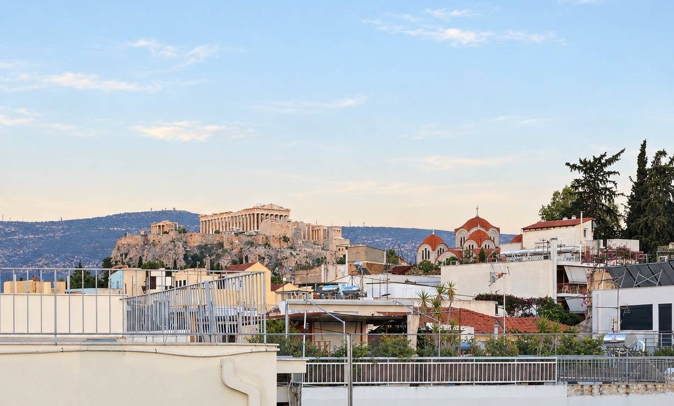 Olive rooftop terrace with Athens skyline